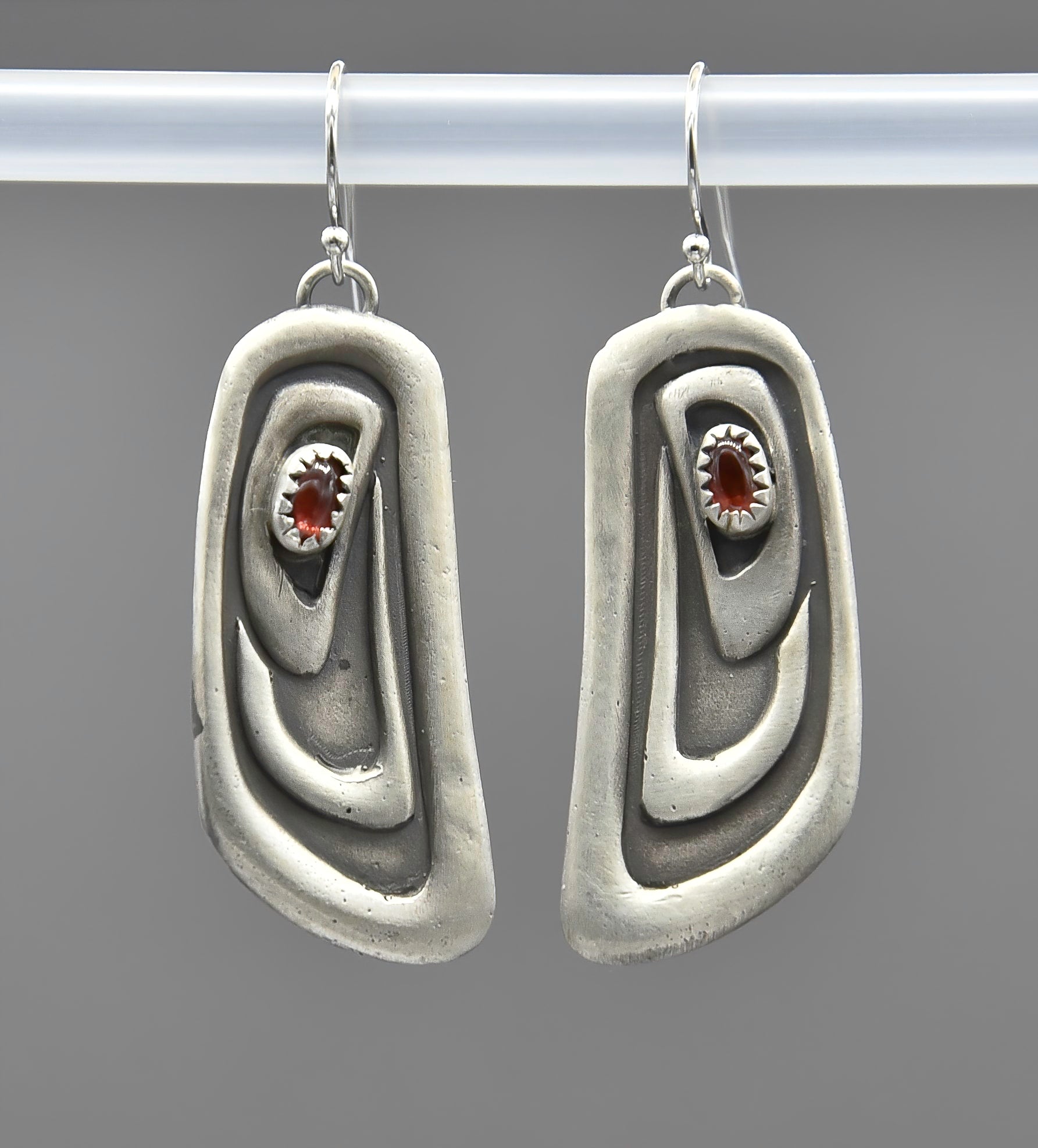 Northwest Coast Ovoid Silver Earrings with Garnet